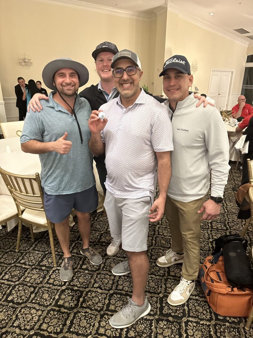 A group of men standing next to each other.