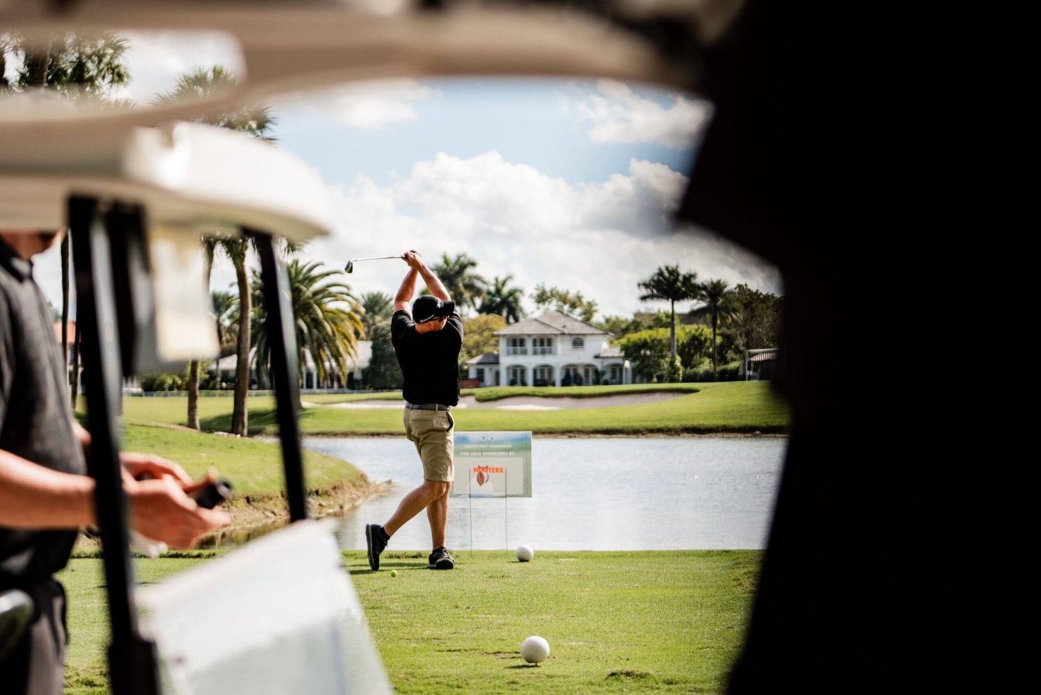 A man is playing golf on the course