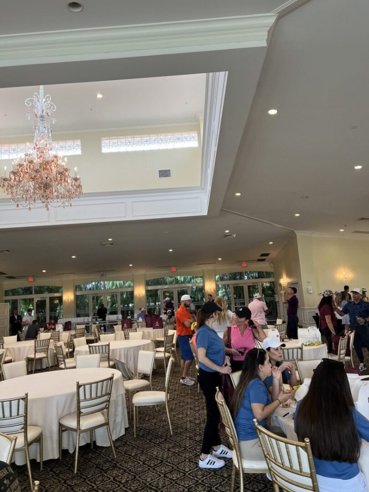 A large room with many tables and chairs