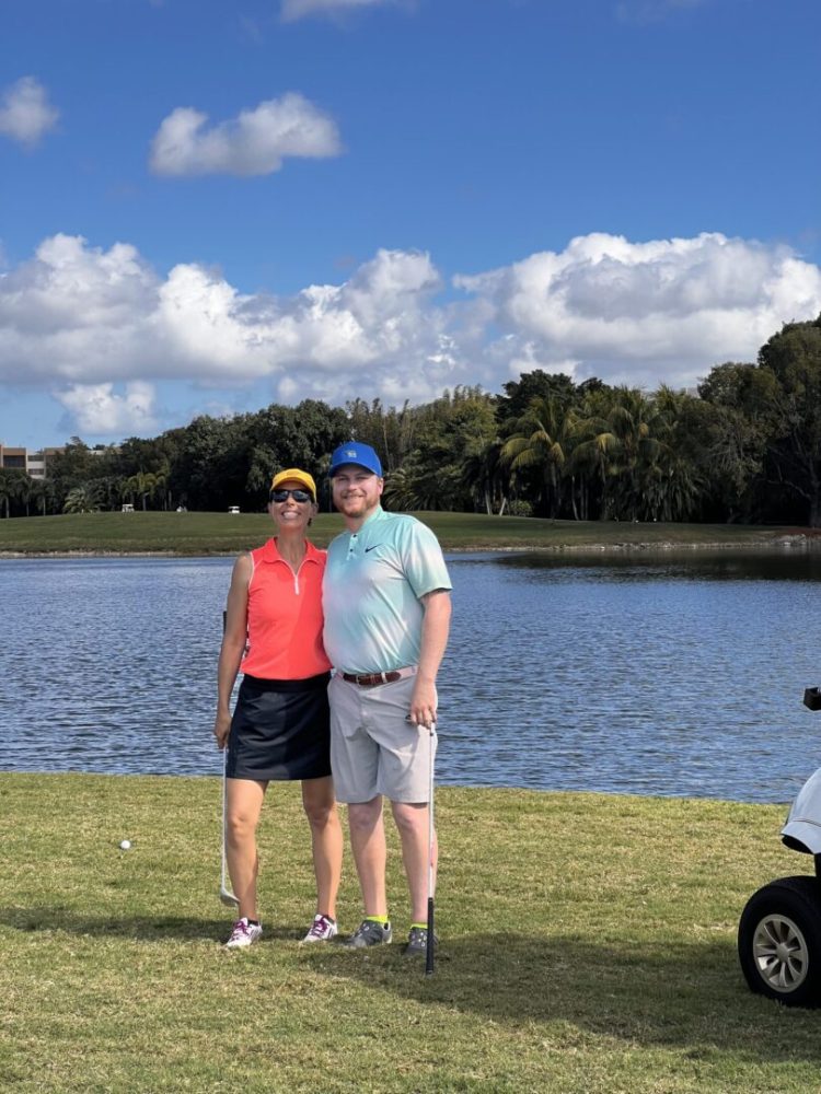 A man and woman standing next to each other.